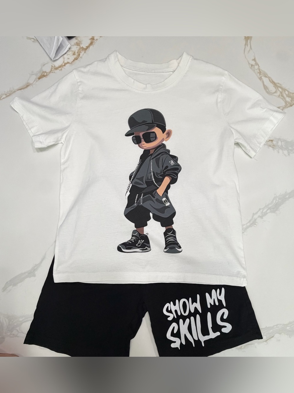 Kids White Graphic Tee with Black Streetwear Character